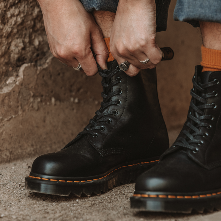 Dr Martens Boots with Orange Socks and Rolled Up Jeans