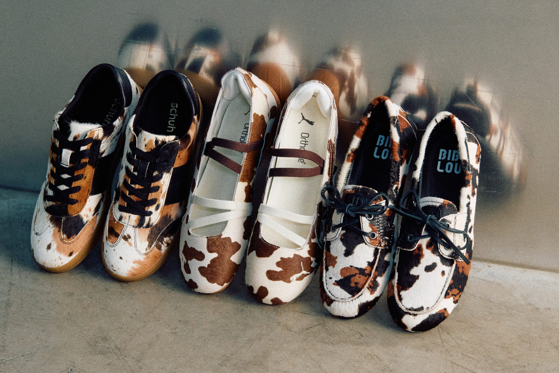 A selection of cow print shoes.
