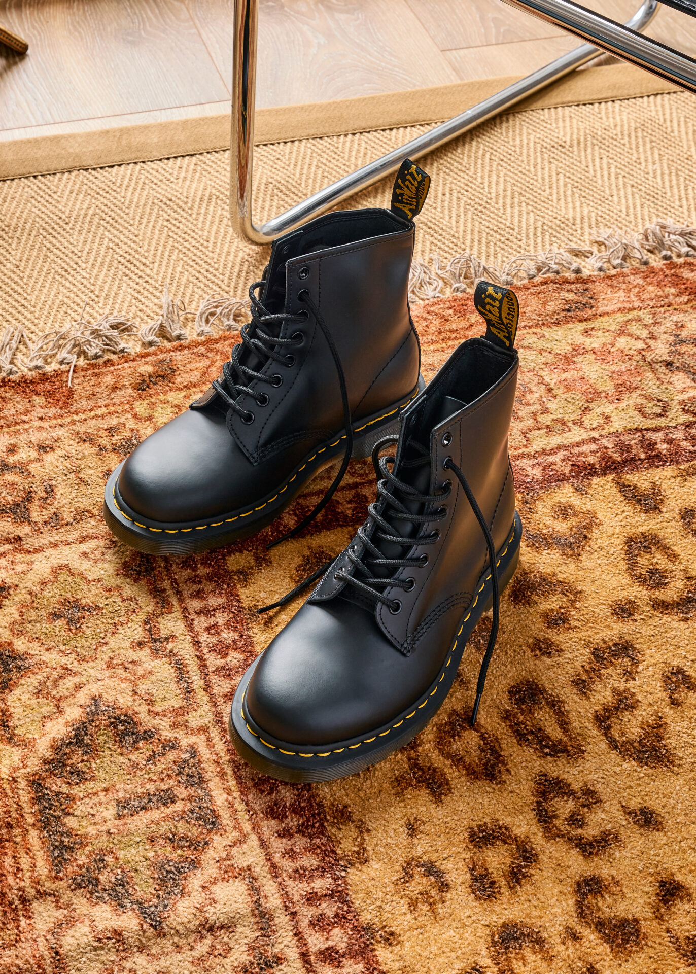 A pair of black Dr. Martens 1460 boots.