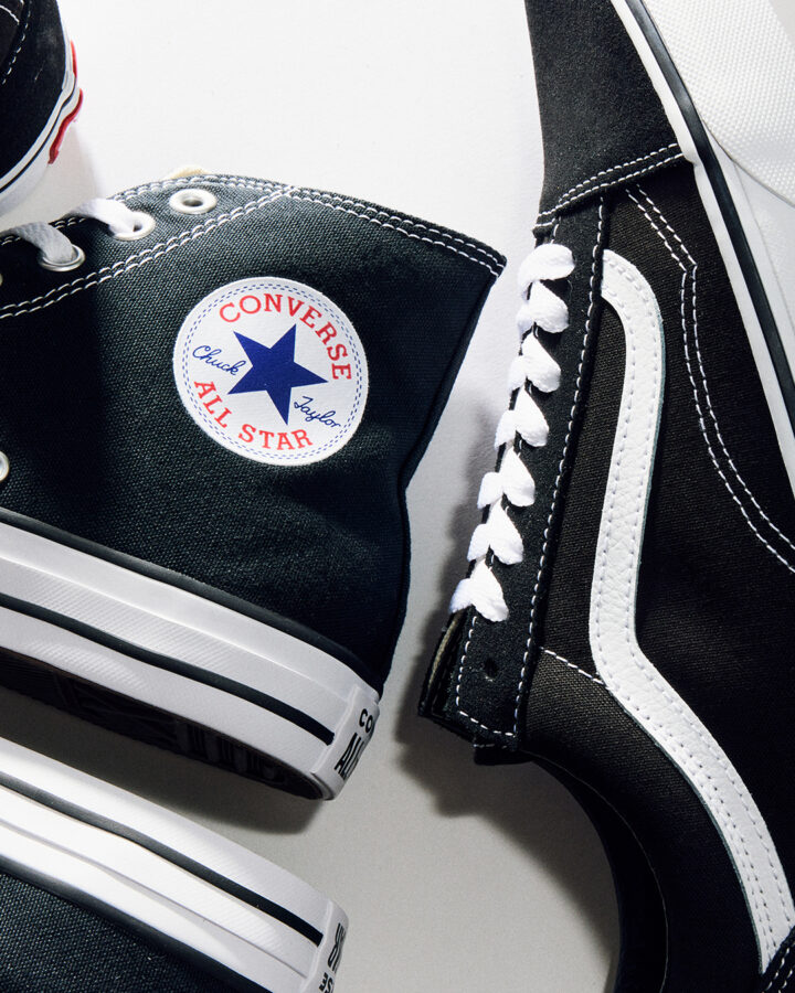 A black Converse All Star Hi and black Vans Old Skool.