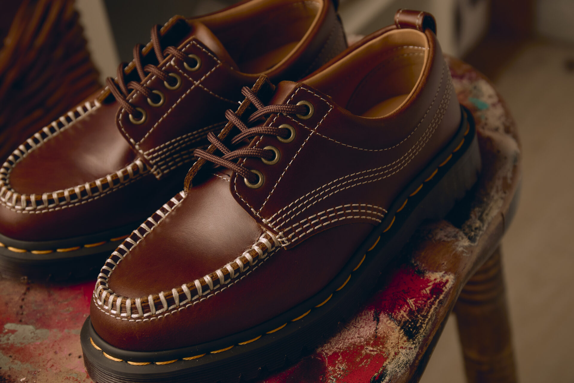 A pair of Dr. Martens Lowell shoes in butterscotch brown.
