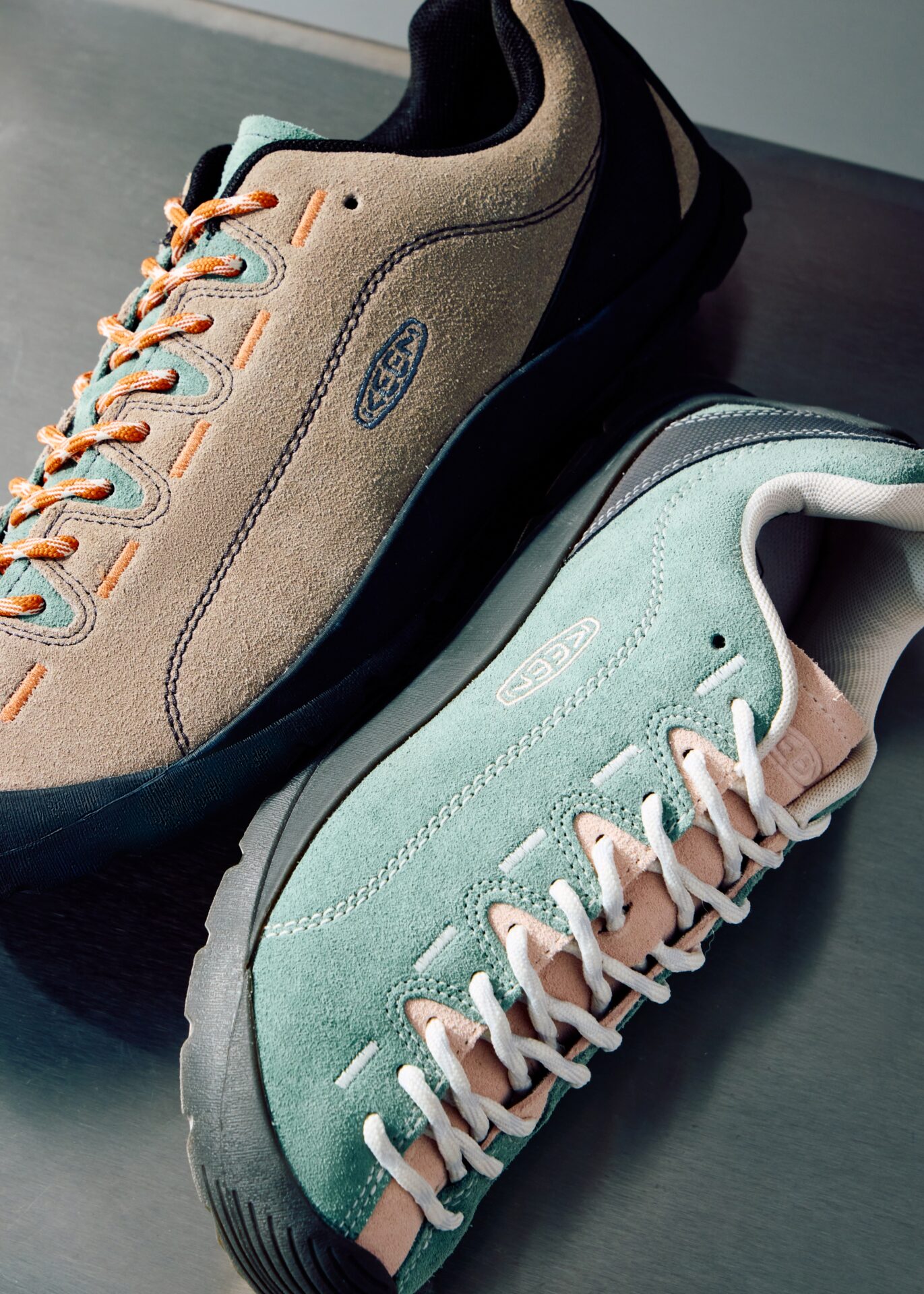 One KEEN Jasper in brown and one in green.