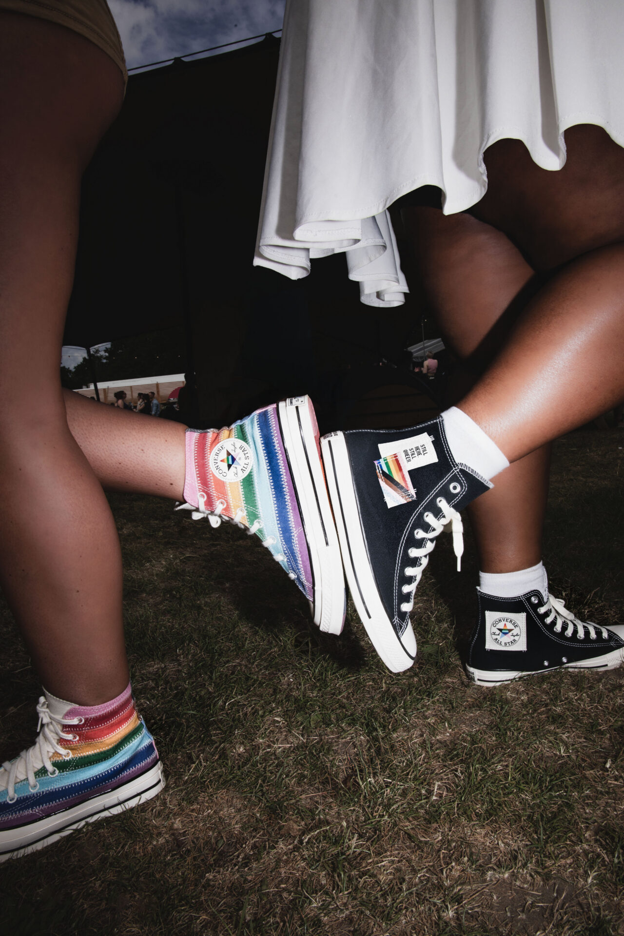 Two people wearing Converse trainers from Converse  ‘Proud to Be’ collection.